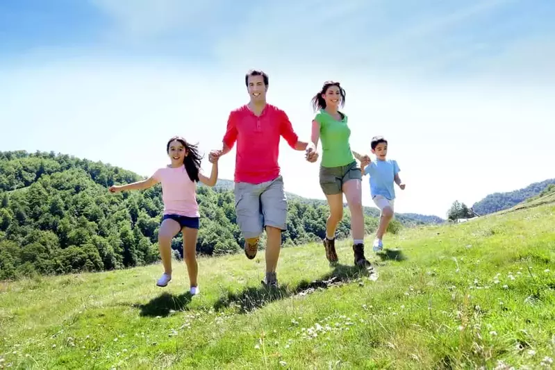 Family enjoying the Smoky Mountains near their affordable Gatlinburg cabin rental